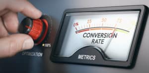 A person turning a dial labeled "optimization" up to 100% next to a meter displaying an increasing "conversion rate.