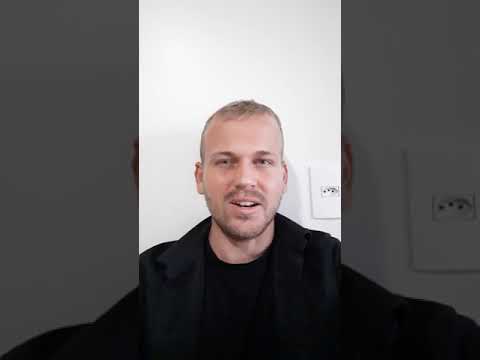 video thumbnail of a man wearing black shirt and coat